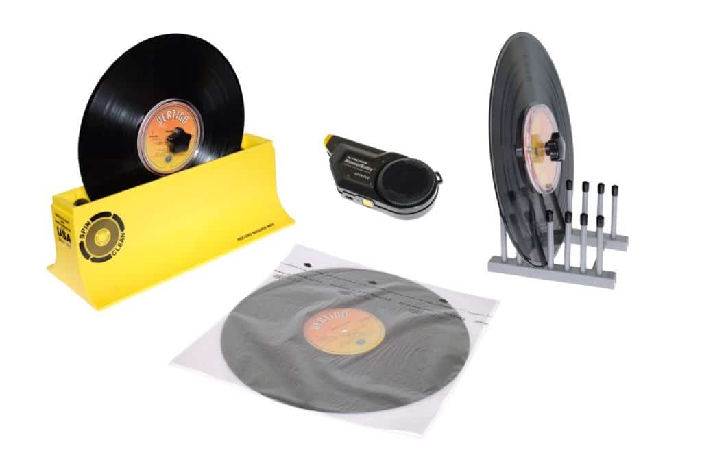 Manual record cleaning kit with vinyl records